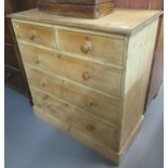 19th Century stripped pine straight fronted chest of two short and three long graduated drawers on a
