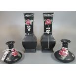 Pair of black ground Shelley vases, together with a pair of black ground Shelly carnation squat