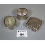 Silver napkin ring 1oz troy, together with a small silver square-shaped box, and another probably