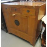 Oriental design, probably Chinese, hardwood side cabinet having three frieze drawers over blind