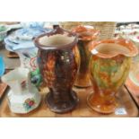 Three Ewenny pottery vases with waved edges, together with a Welsh pottery pouch-shaped jug and