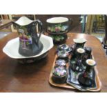 Staffordshire pottery black ground fruit decorated jug and basin set, to include; jug, bowl, two