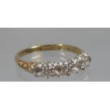 9ct gold four stone gemset ring with diamond points. Ring size P. Approx weight 2 grams. (B.P. 21% +