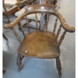 19th Century beech and elm smokers bow spindle backed elbow chair with baluster turned legs, now