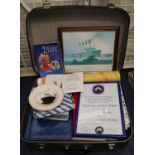Suitcase of Titanic ephemera to include books, framed print, limited edition commemorative plate,