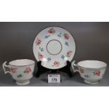 19th Century Swansea porcelain trio, unmarked, hand-painted with pink roses and forget-me-nots, with