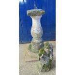 Garden sundial on a weathered composition pedestal and square base, together with a weathered