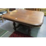 Late 19th Century oak extending breakfast table of rectangular form with additional leaf on a