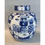 Chinese porcelain baluster shaped ginger jar and cover. Overall decorated with prunus blossom on a
