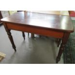Edwardian stained pine side table of rectangular form on baluster turned supports. (B.P. 21% + VAT)