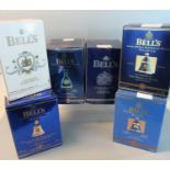 Collection of six Bell's porcelain Scotch whisky decanters, all in original boxes, commemorative