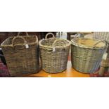 Two similar wicker two-handled baskets, one circular and one square form, together with another. (3)