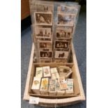 Wicker basket containing assorted cigarette cards, various topics and genres. (B.P. 21% + VAT)