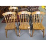 Set of three mid century pub type spindle chairs, together with a set of four modern spindle back