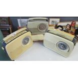 Three vintage Bush radios, one with certificate of authenticity stating: 'authentic updated