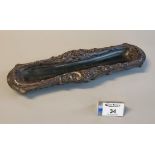 Victorian composition Rococo style pen tray with mask mount scroll work and relief fruit. 30cm