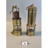 Two vintage brass miner's safety lamps to include a Davy type example. (2) (B.P. 21% + VAT)