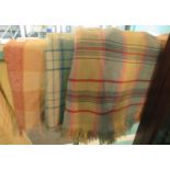 Three vintage woollen check blankets or carthen in various colours. (3) (B.P. 21% + VAT)