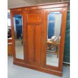 Edwardian mahogany inlaid two door mirrored wardrobe on a platform base. (B.P. 21% + VAT) Dimensions