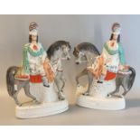 Pair of 19th Century Staffordshire pottery flat backed figurines of Scotsmen with kilts on