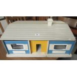 Mid Century child's dolls house in the form of a bungalow. (B.P. 21% + VAT)