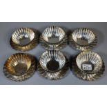 Set of six Japanese sterling Asahi 950 tea bowls and saucers of fluted form. 40 troy ozs approx. (