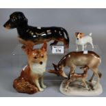 Collection of ceramic animals to include Beswick Dachshund, a seated fox, a Beswick hunting Jack