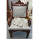Late 19th/early 20th century pitch pine ecclesiastical design throne chair with scroll carved arms