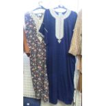 Two vintage Al Hamad, Bahrain traditional thobe style short sleeve robes; one in printed polka dot