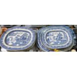 Eleven 'Willow' pattern meat dishes of various sizes. (B.P. 21% + VAT)