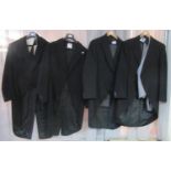 Collection of men's early to mid 20th Century clothing to include; four black woollen tailcoats, one