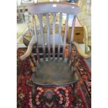 Late 19th/early 20th century oak and elm stained slat back farmhouse kitchen arm chair. (B.P.