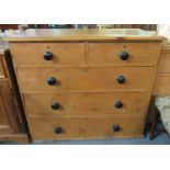 Victorian pine straight front chest of two short and three long drawers with ebonised turned