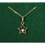 9ct gold diamond set star pendant. Approx weight 1.3 grams. (B.P. 21% + VAT)