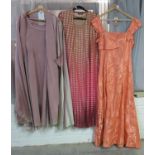 Various items of lady's vintage clothing to include; a peach damask rose design bridesmaid's dress