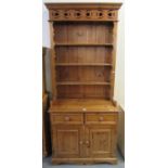 Modern pine two stage, rack back dresser of narrow proportions with carved heart-shaped design