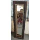 Modern industrial design pine framed rectangular mirror of narrow proportions with metal mounts