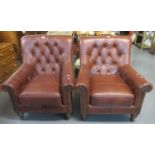 Alexander & James, a pair of brown leather button back arm chairs. (2) (B.P. 21% + VAT)