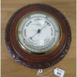 Kelvin & James White Ltd Glasgow enamelled wall barometer of circular carved form. (B.P. 21% + VAT)