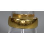 22ct gold wedding ring. Ring size P. Approx weight 5.8 grams. (B.P. 21% + VAT)