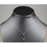 18ct white gold diamond pendant on chain. Approx weight 2.2 grams. (B.P. 21% + VAT)