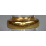 22ct gold wedding ring. Ring size L&1/2. Approx weight 5.2 grams. (B.P. 21% + VAT)