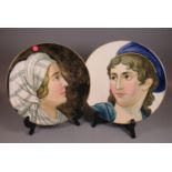 Pair of Victorian Doulton cabinet plates hand painted with portraits of a young maiden and