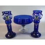 Pair of Victorian blue glass vases hand painted with enamelled butterflies, flowers and foliage.