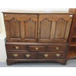 Early 19th Century Welsh oak two stage press cupboard, the moulded top above two blind panelled