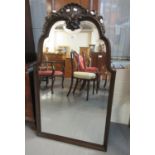 19th century stained walnut bevel plate mirror with an arch top and moulded scroll, shell and