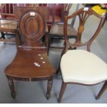 Victorian mahogany hall chair with an oval moulded back and a shaped seat, standing on ring turned