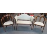 Edwardian mahogany inlaid three-piece parlour suite comprising a pair of tub armchairs and two