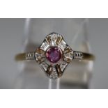 9ct gold ruby and diamond ring. Ring size N. Approx weight 1.4 grams. (B.P. 21% + VAT)