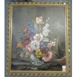 E Vanderman, still life study of a bouquet of flowers in a vase, oils on canvas, in gilt foliate